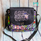 Strange and Unusual Harrison Crossbody Bag